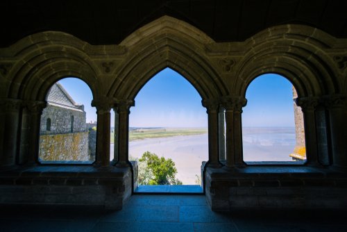 View of Mont Saint-Michel Bay from Abbey Window on a Sunny Summer Day in Normandy France