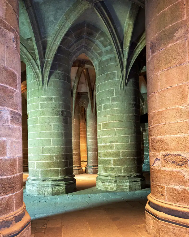 Illuminated interior of massive castle in France, Europe